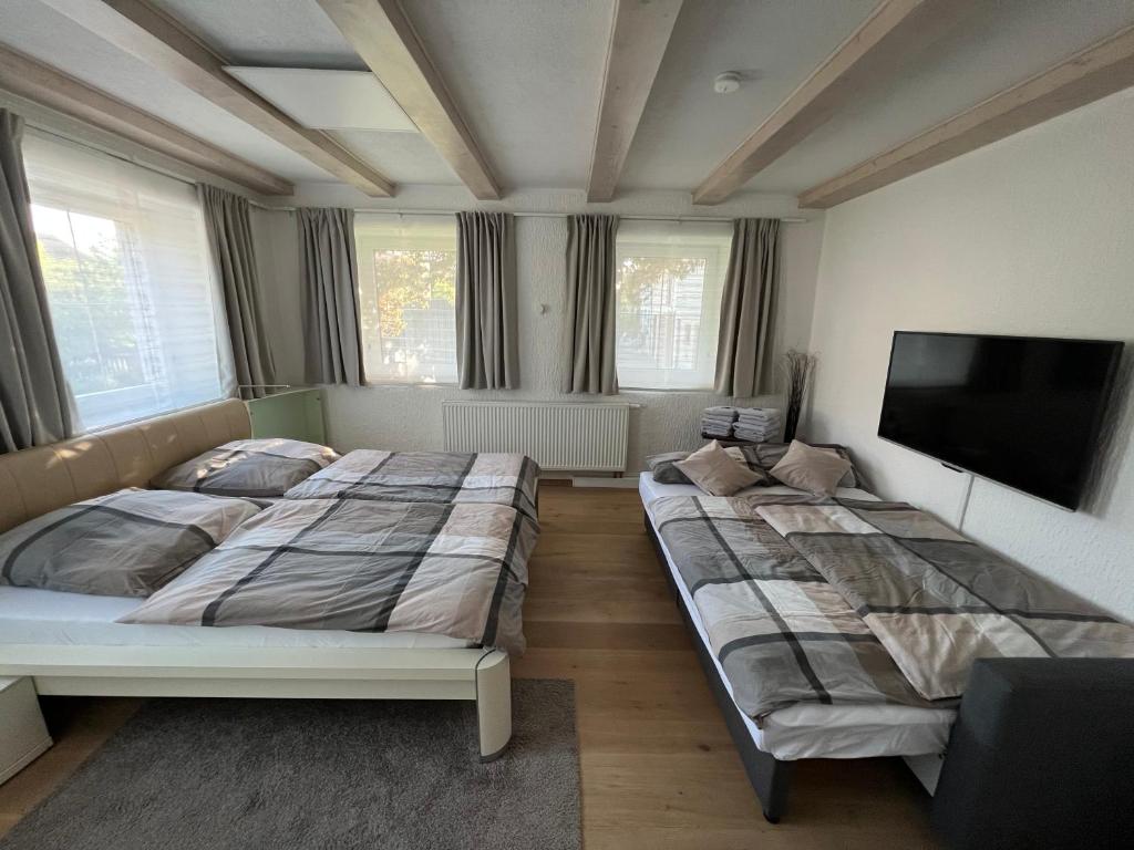 Postel nebo postele na pokoji v ubytování Gästezimmer Kirchdorf