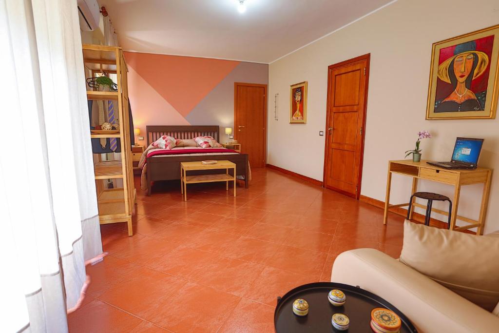 Postel nebo postele na pokoji v ubytování B&B CasaBuddace