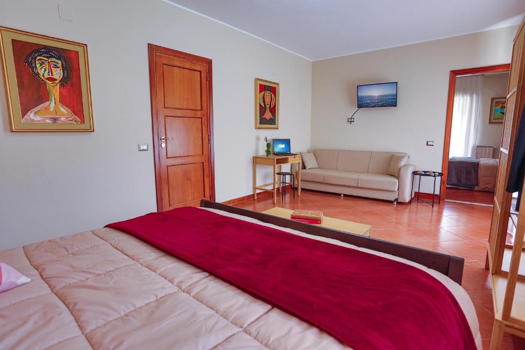 Postel nebo postele na pokoji v ubytování B&B CasaBuddace