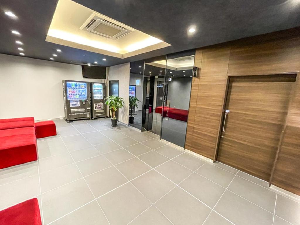 TV a/nebo společenská místnost v ubytování HOTEL LiVEMAX Takamatsu Eki Mae