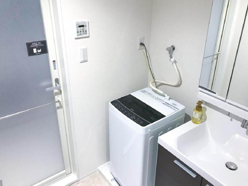 Koupelna v ubytování HOTEL LiVEMAX Takamatsu Eki Mae