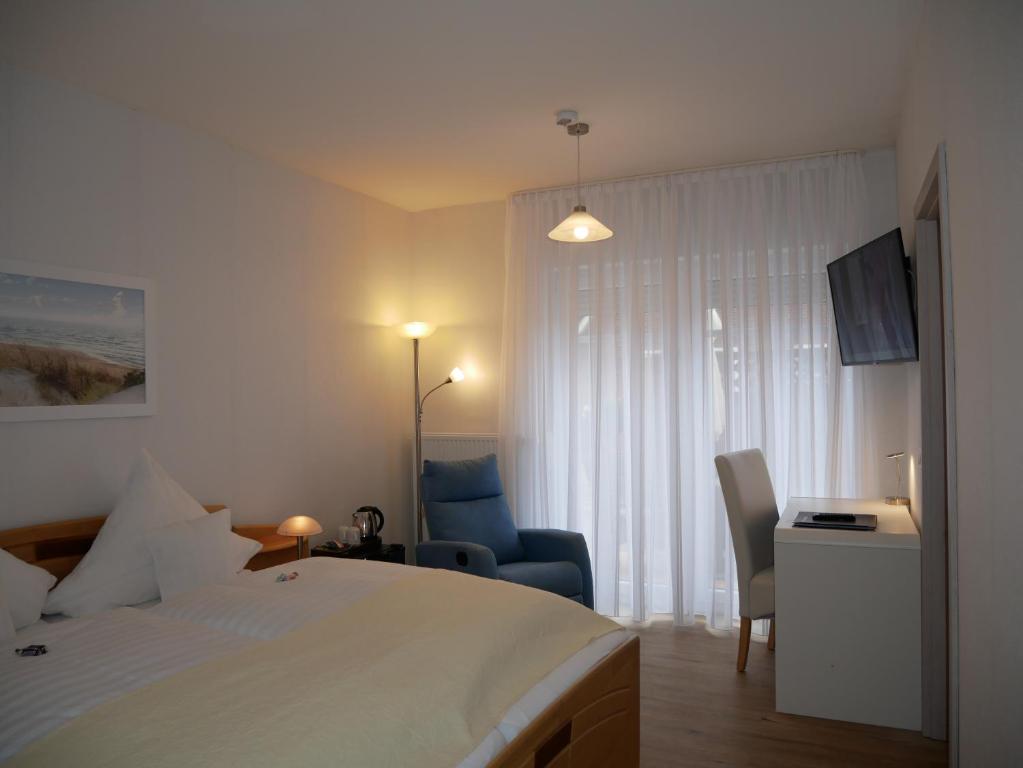 TV a/nebo společenská místnost v ubytování Hotel Thule