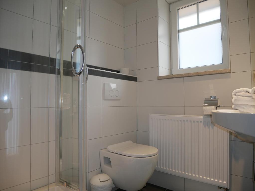 Koupelna v ubytování Hotel Thule