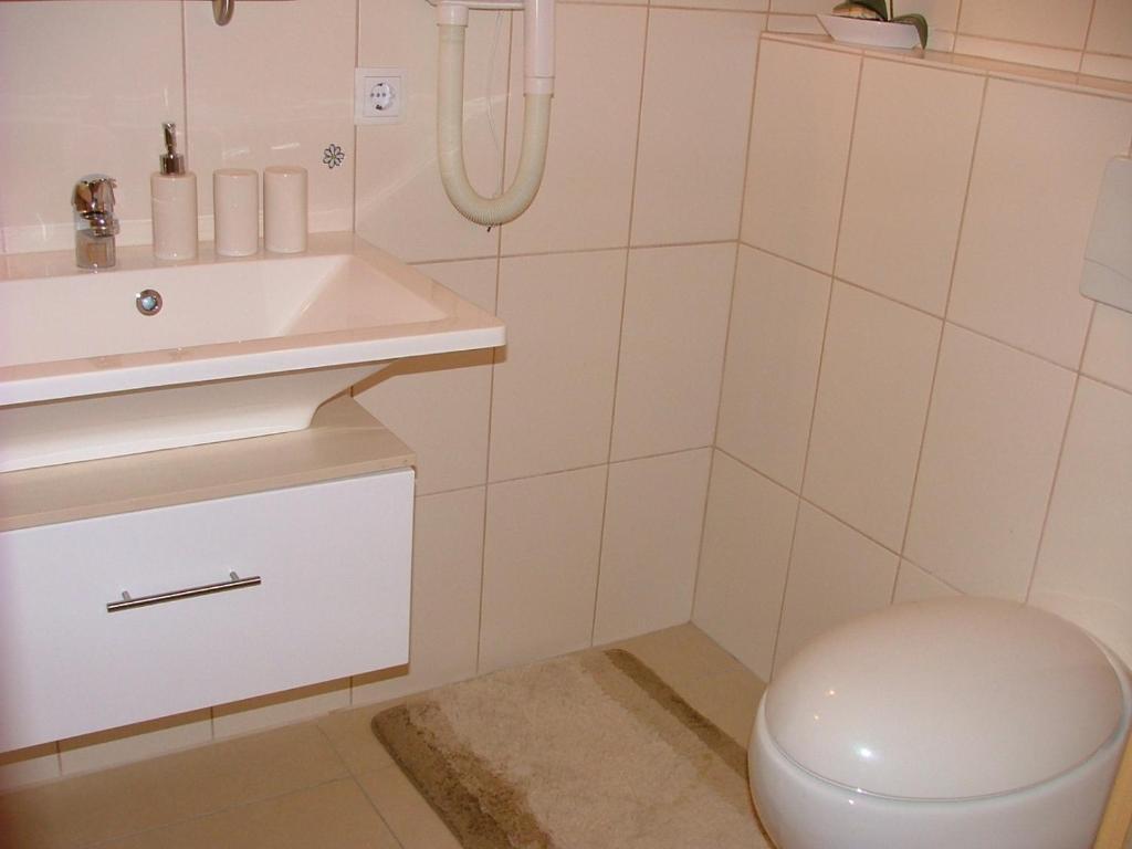 Koupelna v ubytování Hotel Thule
