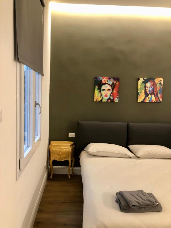 A bed or beds in a room at Novella Suite