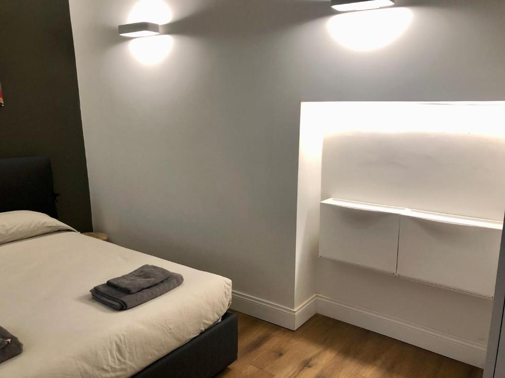A bed or beds in a room at Novella Suite