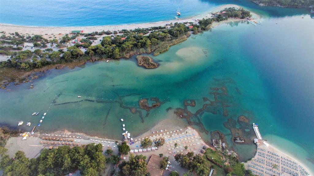 an aerial view of an island in the water at Sugar Beach Club in Oludeniz