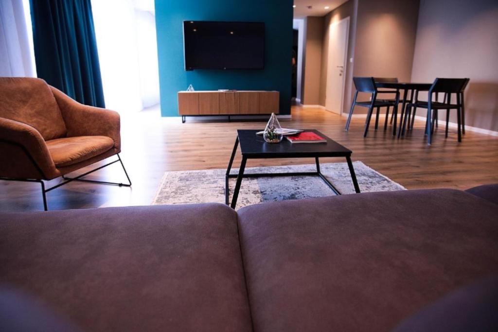 TV a/nebo společenská místnost v ubytování Swiss Apartments Prishtina