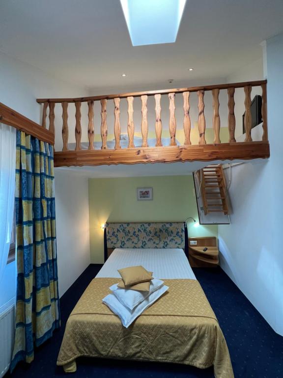 Postel nebo postele na pokoji v ubytování Hotel Doi Taurasi