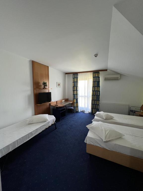 Postel nebo postele na pokoji v ubytování Hotel Doi Taurasi