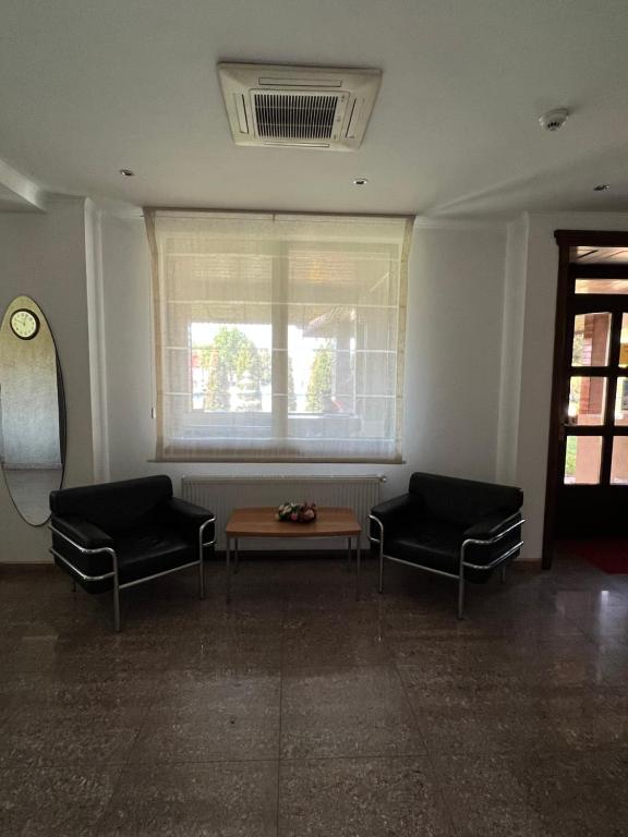 Posezení v ubytování Hotel Doi Taurasi