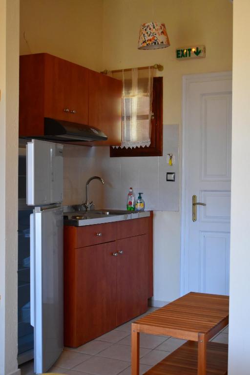 Kuchyň nebo kuchyňský kout v ubytování Villa Krini