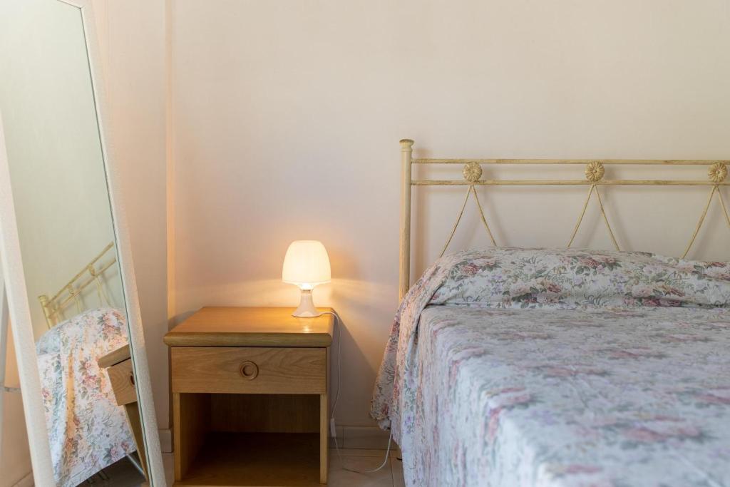 Posteľ alebo postele v izbe v ubytovaní Appartamento vicino al mare