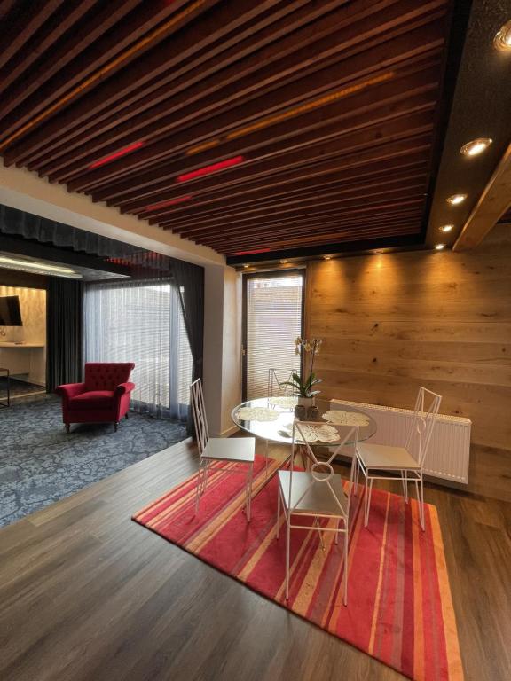 a dining room with a table and chairs at Guest House Bermuuda Family Apartment in Paide