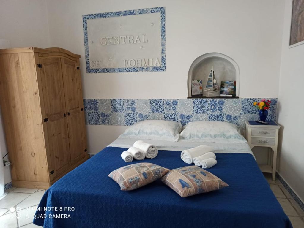 Postel nebo postele na pokoji v ubytování Central GH Formia
