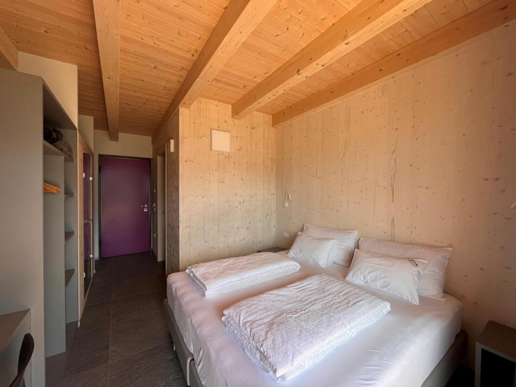A bed or beds in a room at Agriturismo Margone
