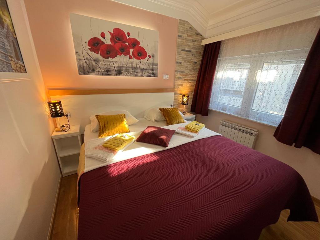Postel nebo postele na pokoji v ubytování Hostel Dino