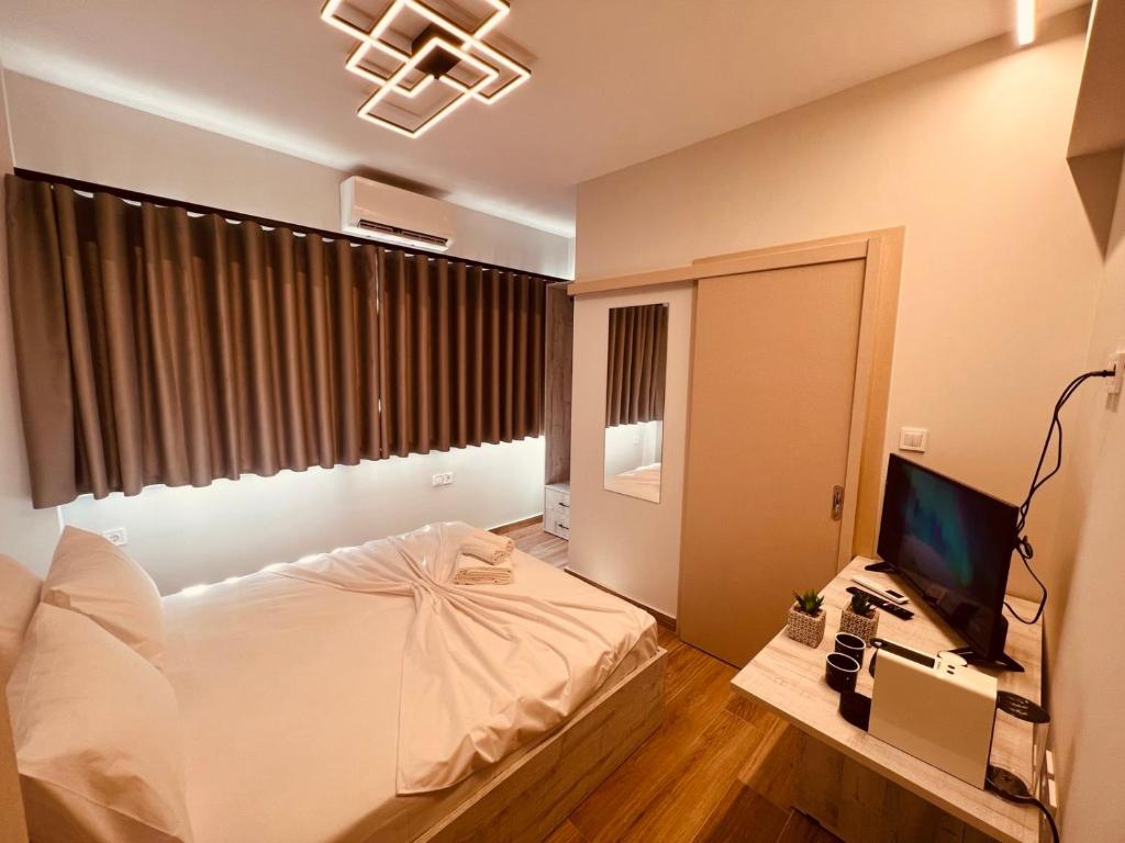 Postel nebo postele na pokoji v ubytování CentralViewSuites