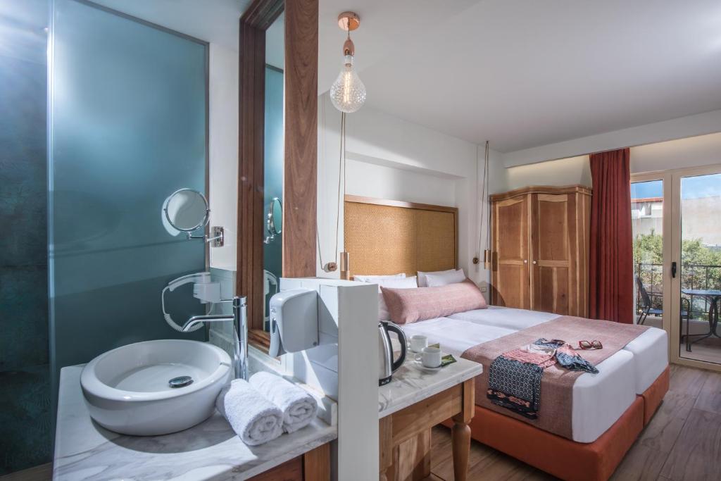 Ліжко або ліжка в номері Anesis Blue Boutique Hotel