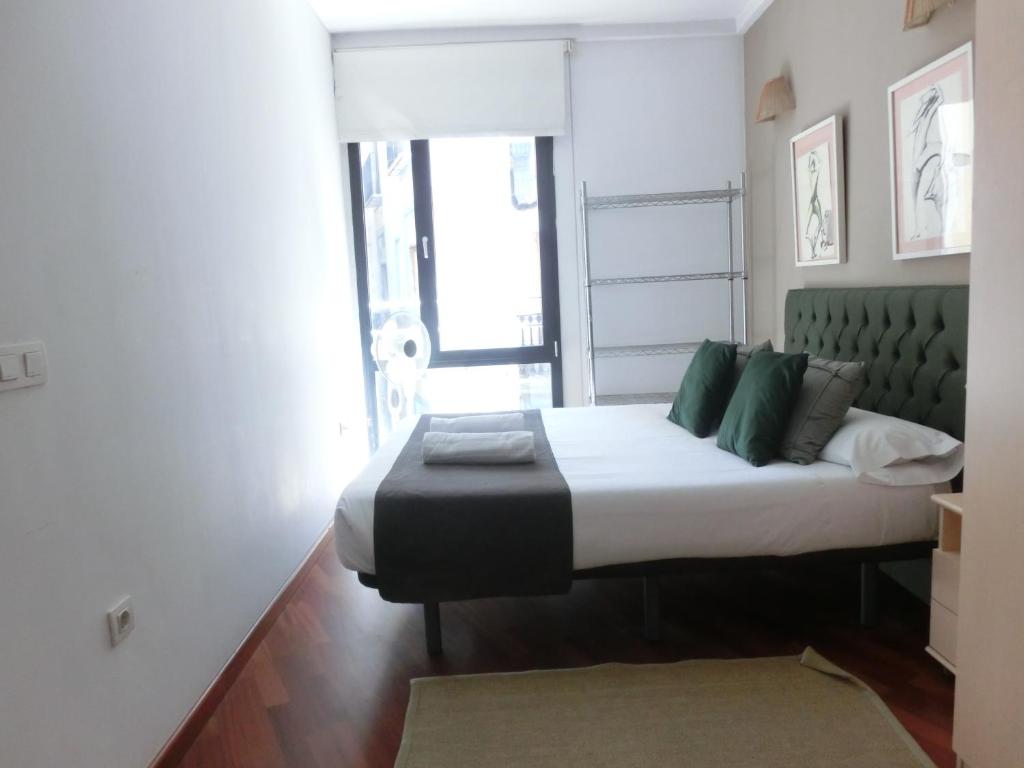 Postel nebo postele na pokoji v ubytování Total Valencia (Leisure & Culture)