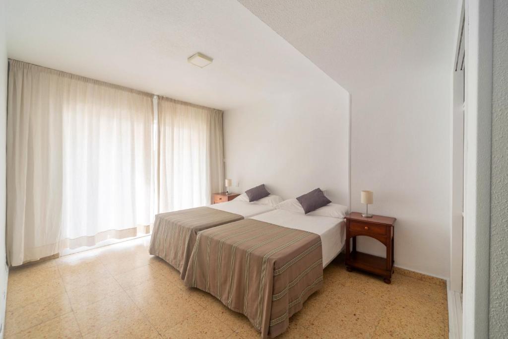 Postel nebo postele na pokoji v ubytování Apartamentos Maja