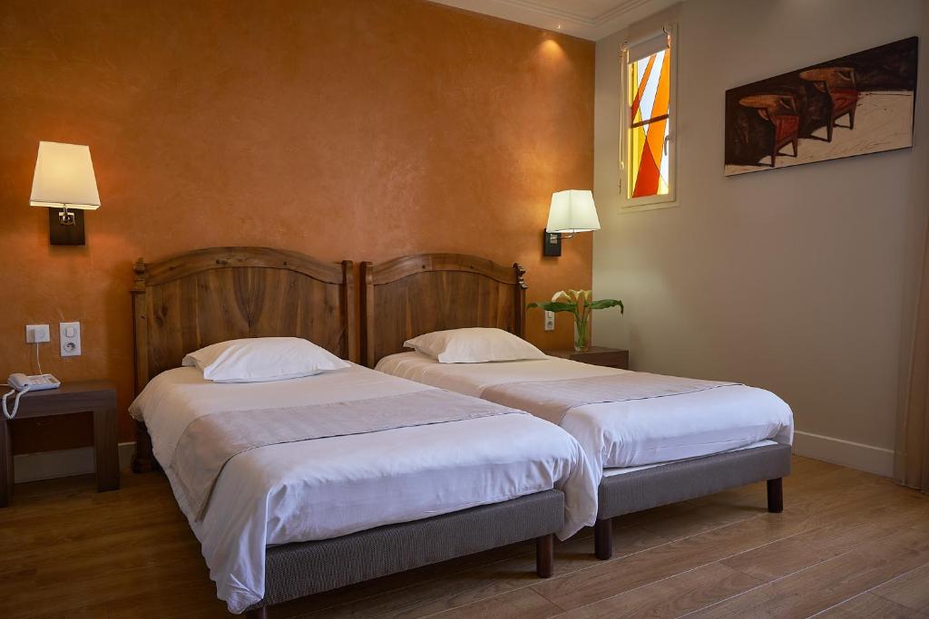 Postel nebo postele na pokoji v ubytování Chateau de Creissels