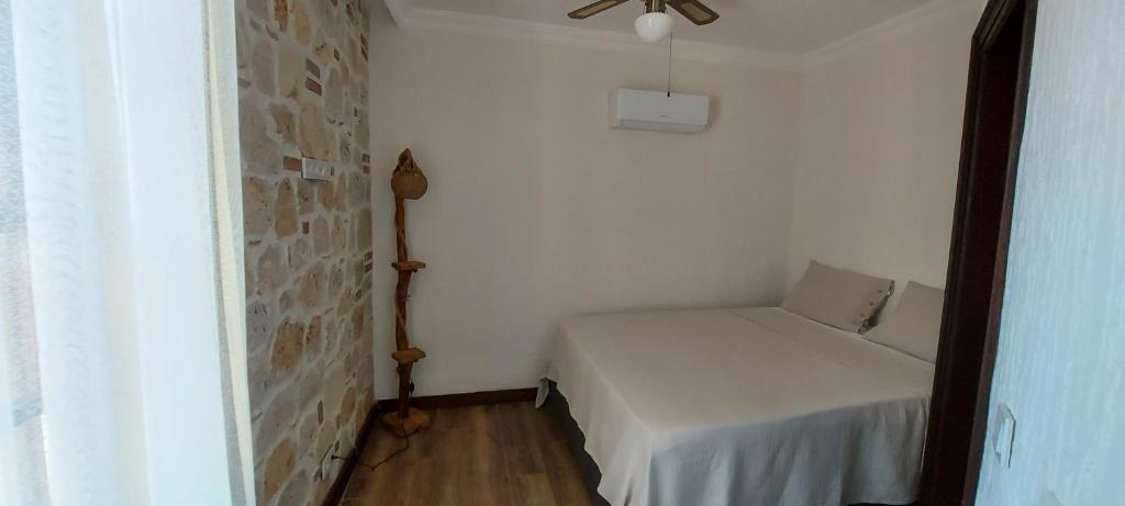 Cama o camas de una habitaci&oacute;n en Villa Citronella Boutique Hotel