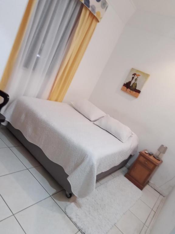 Llit o llits en una habitació de Hotel Palermo Quintero