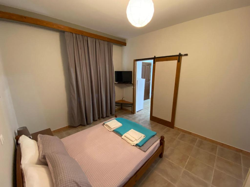 Posteľ alebo postele v izbe v ubytovaní Kalamata home, Marina C