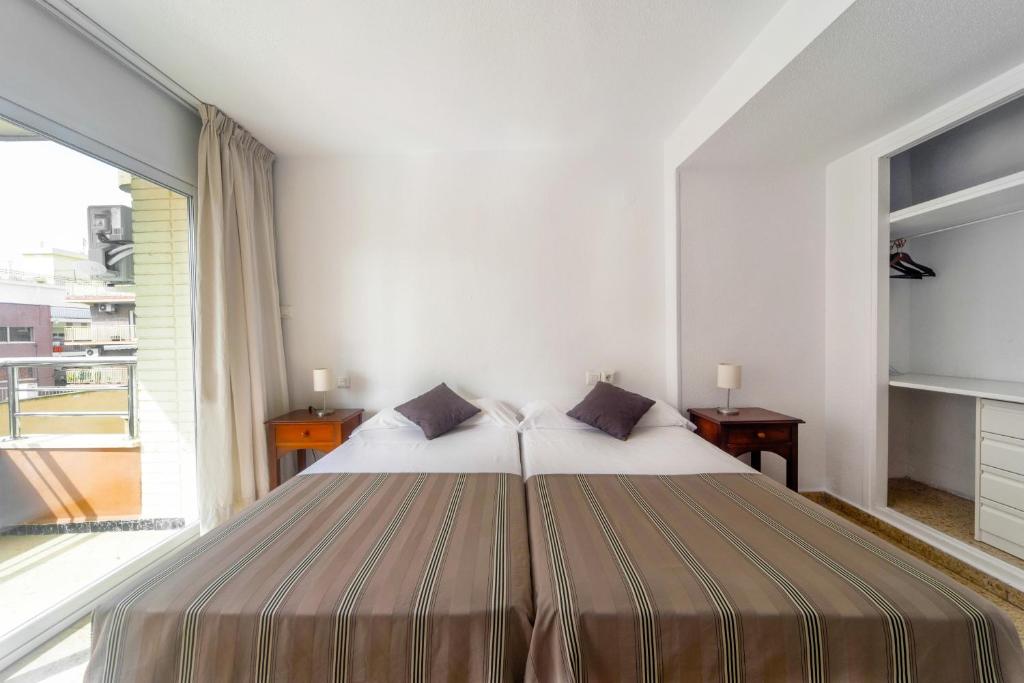 Postel nebo postele na pokoji v ubytování Apartamentos Maja