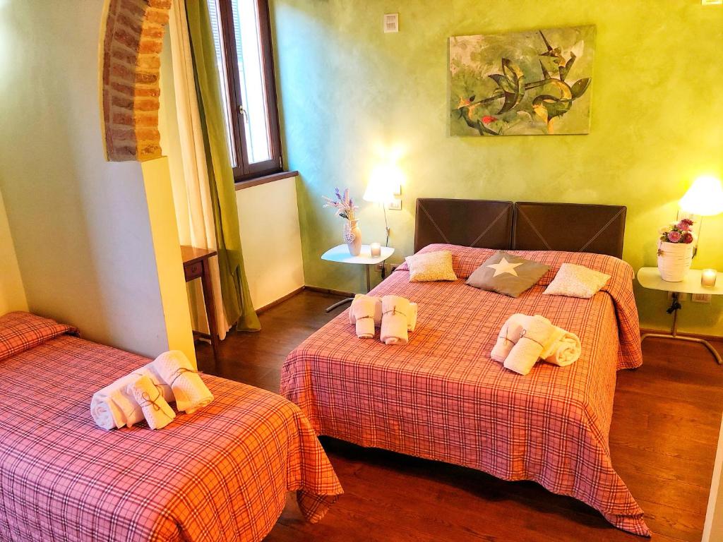 Postel nebo postele na pokoji v ubytování Bed & Breakfast Montepulciano