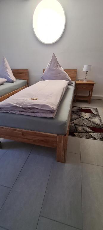Postel nebo postele na pokoji v ubytování byJoe