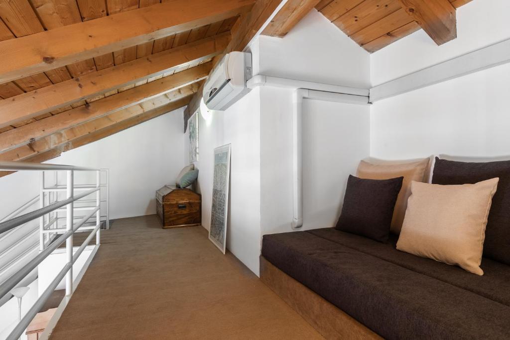 Kuchyň nebo kuchyňský kout v ubytování A Casa Nuccia Mansarda by Holiday Solutions