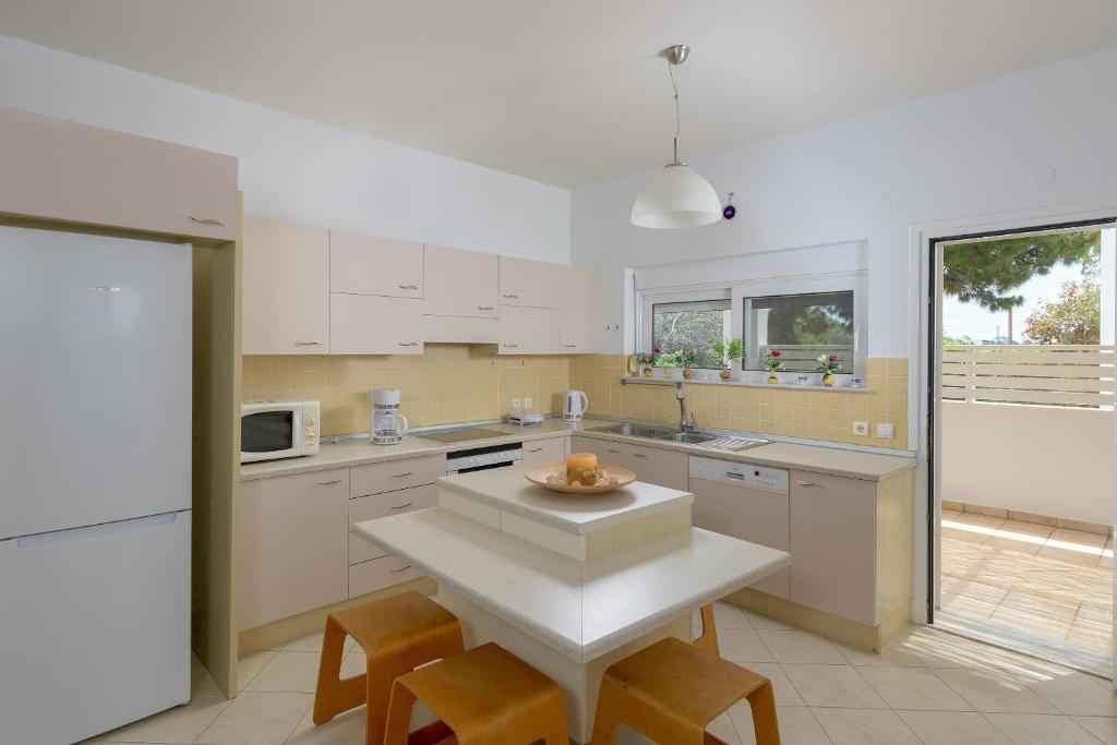 Kuchyň nebo kuchyňský kout v ubytování Villa Evelyn