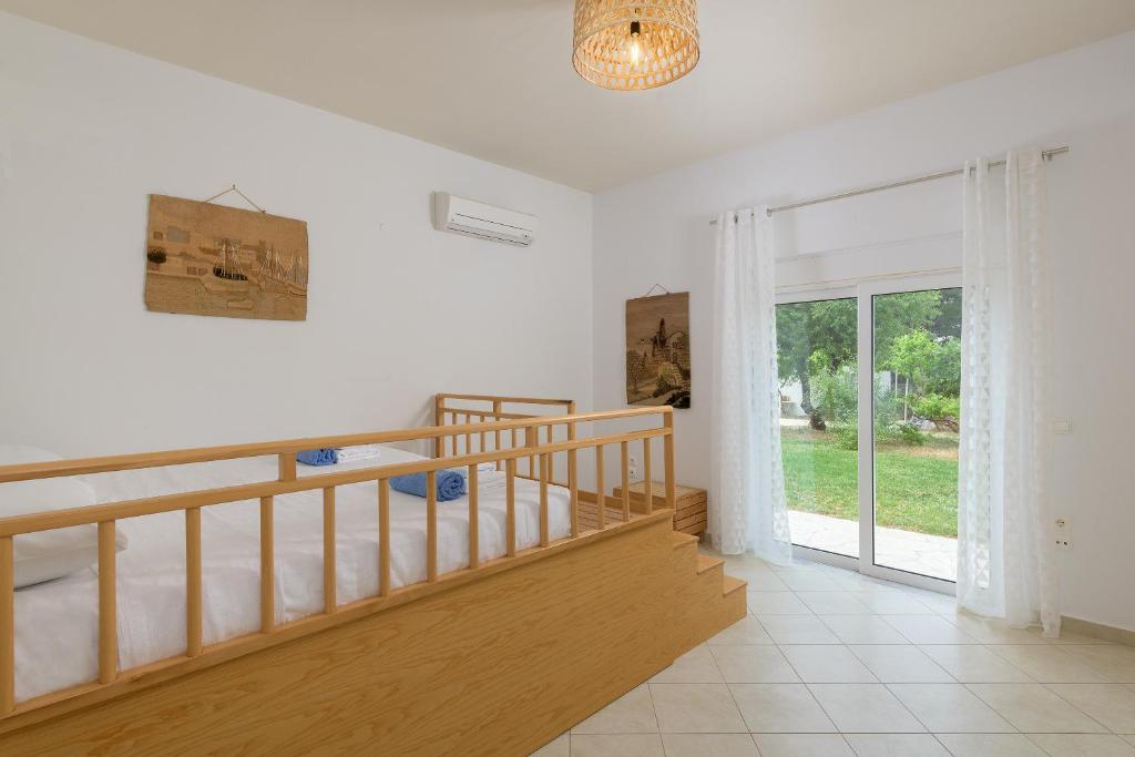 Postel nebo postele na pokoji v ubytování Villa Evelyn