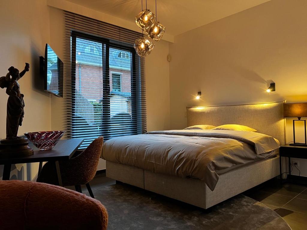 Postel nebo postele na pokoji v ubytování Maison Gand