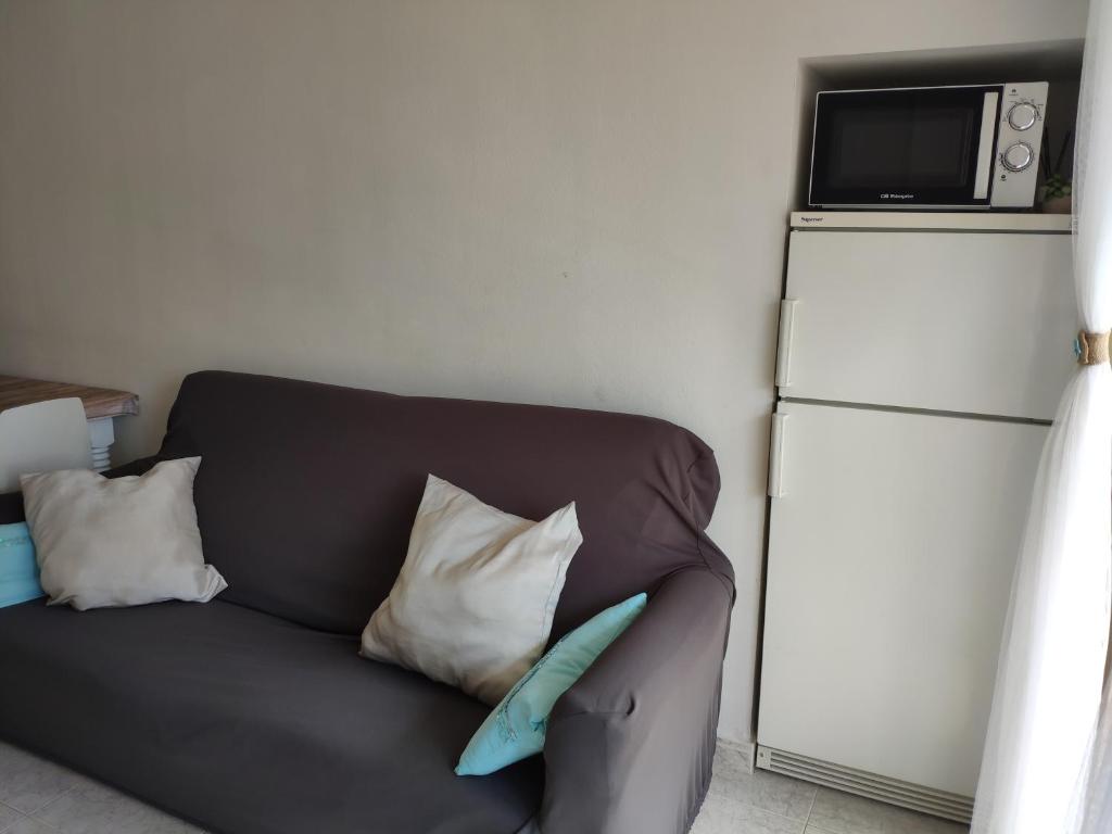 TV a/nebo společenská místnost v ubytování Apartamento a 150 metros de la playa en la Fosca