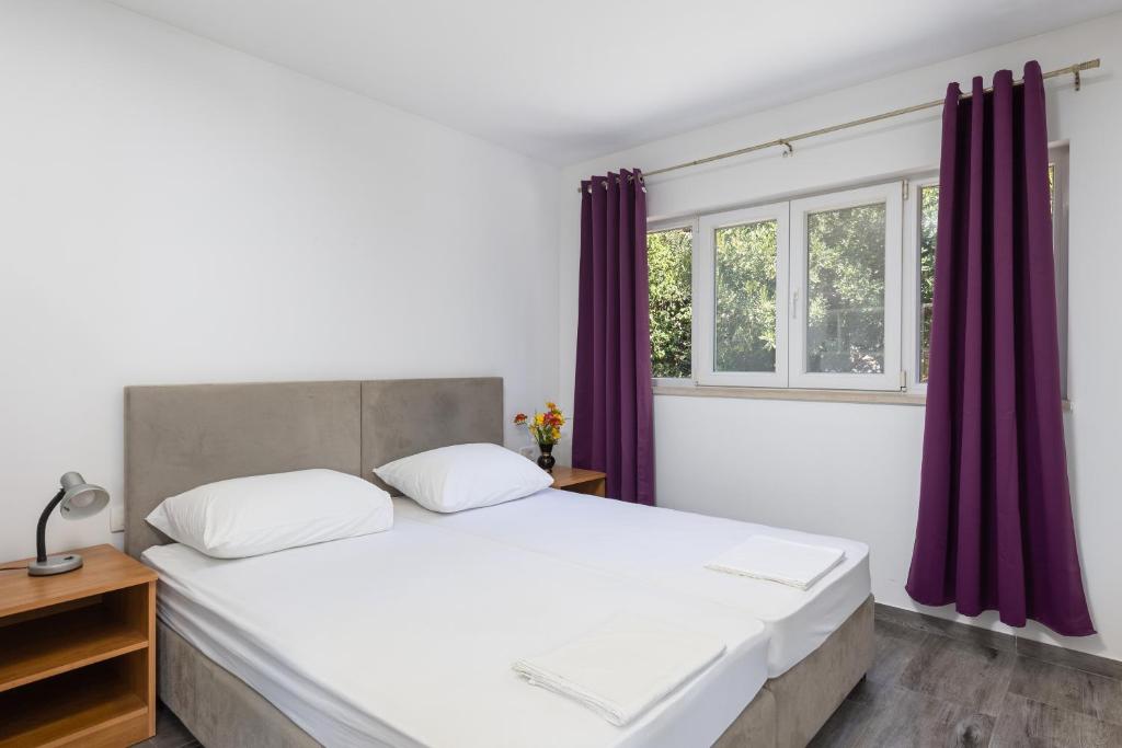 Posteľ alebo postele v izbe v ubytovaní Gabriel Apartment Dubrovnik