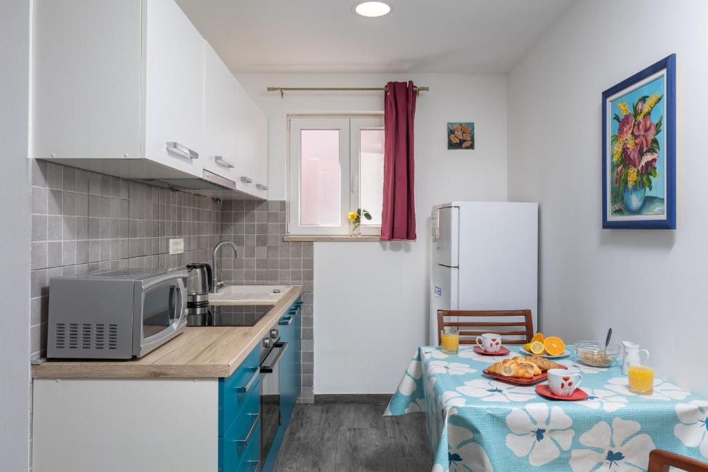 Kuchyňa alebo kuchynka v ubytovaní Gabriel Apartment Dubrovnik