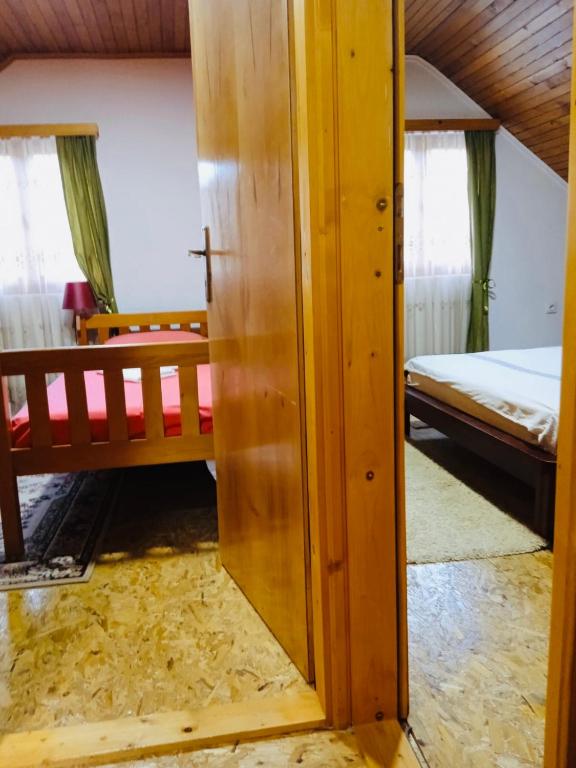 Postel nebo postele na pokoji v ubytování Household Nikolic - Andrijevica, Montenegro