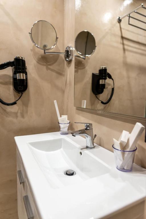 Koupelna v ubytování Onar hotel