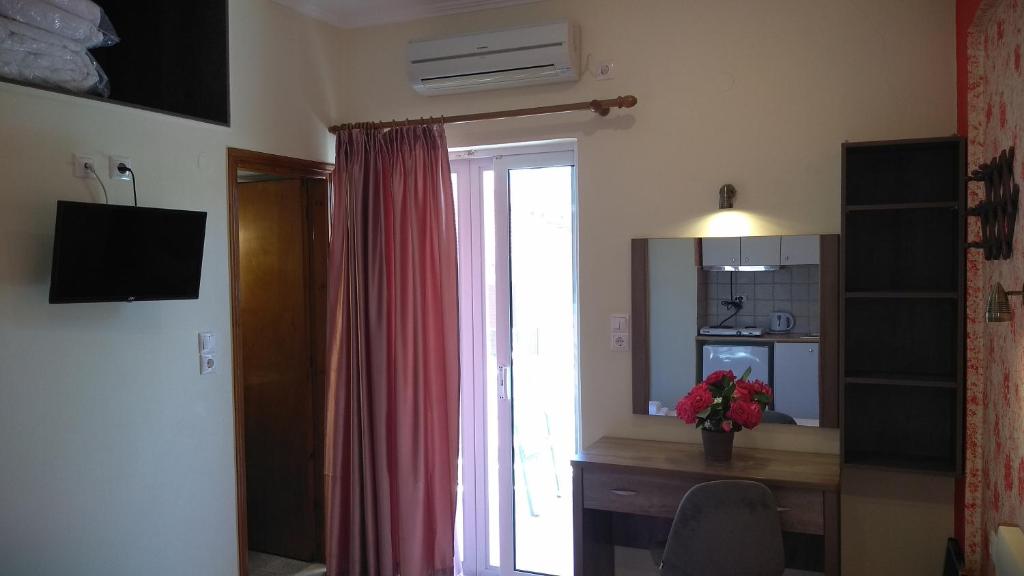 Kuchyň nebo kuchyňský kout v ubytování Gogo's - Γωγώ Rooms & Studios