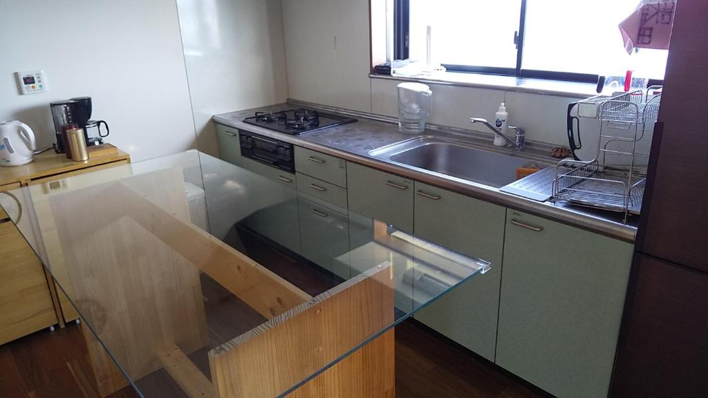 Kuchyň nebo kuchyňský kout v ubytování taiza house