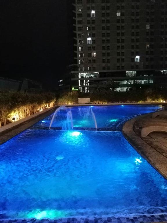 Bazén v ubytování AEON TOWERS STUDIO SUITE (by:skyspottravelcentra) nebo v jeho okolí
