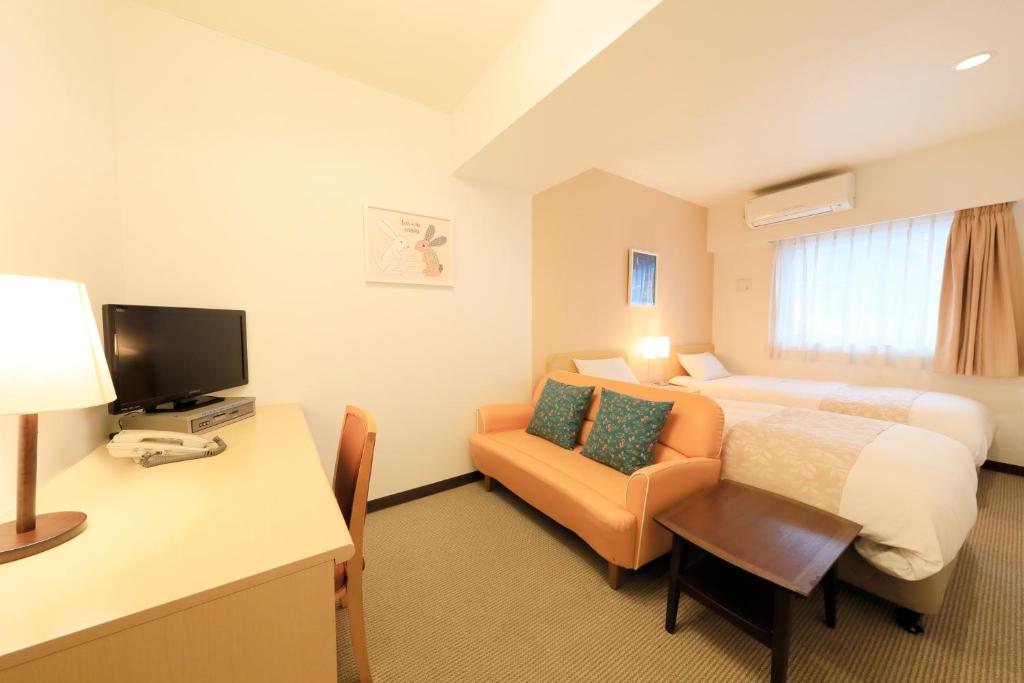 TV a/nebo společenská místnost v ubytování Hotel Famy Inn Kinshicho