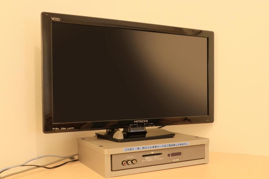 TV a/nebo společenská místnost v ubytování Hotel Famy Inn Kinshicho