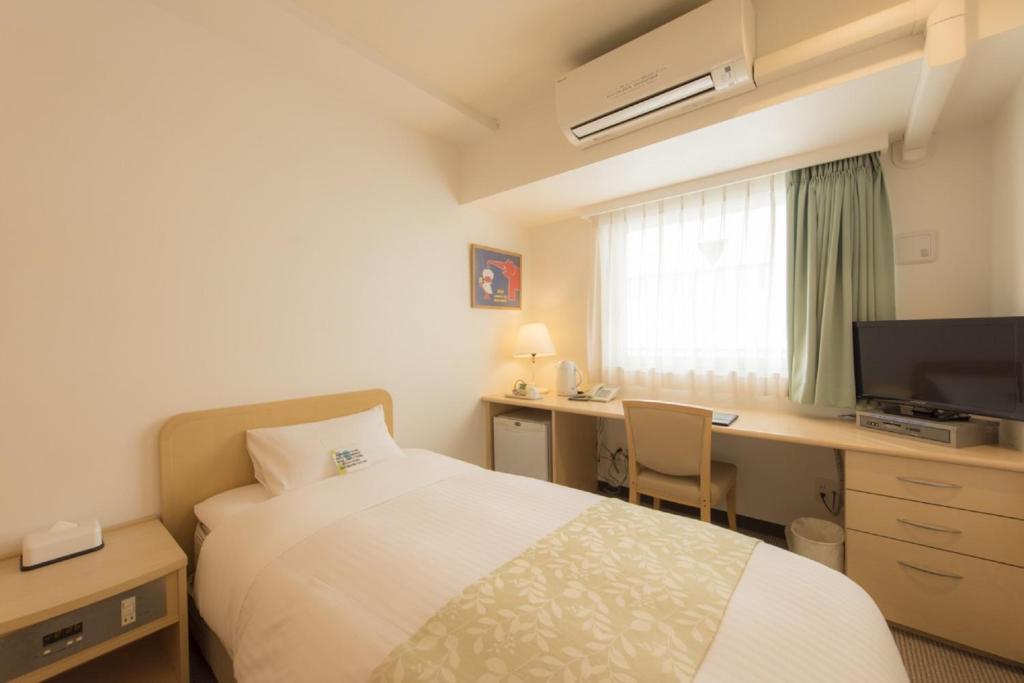 TV a/nebo společenská místnost v ubytování Hotel Famy Inn Kinshicho