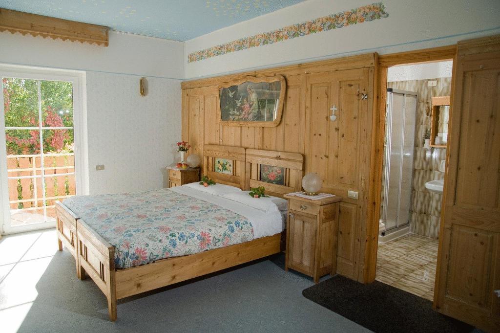 Postel nebo postele na pokoji v ubytování Hotel Rosa Resort