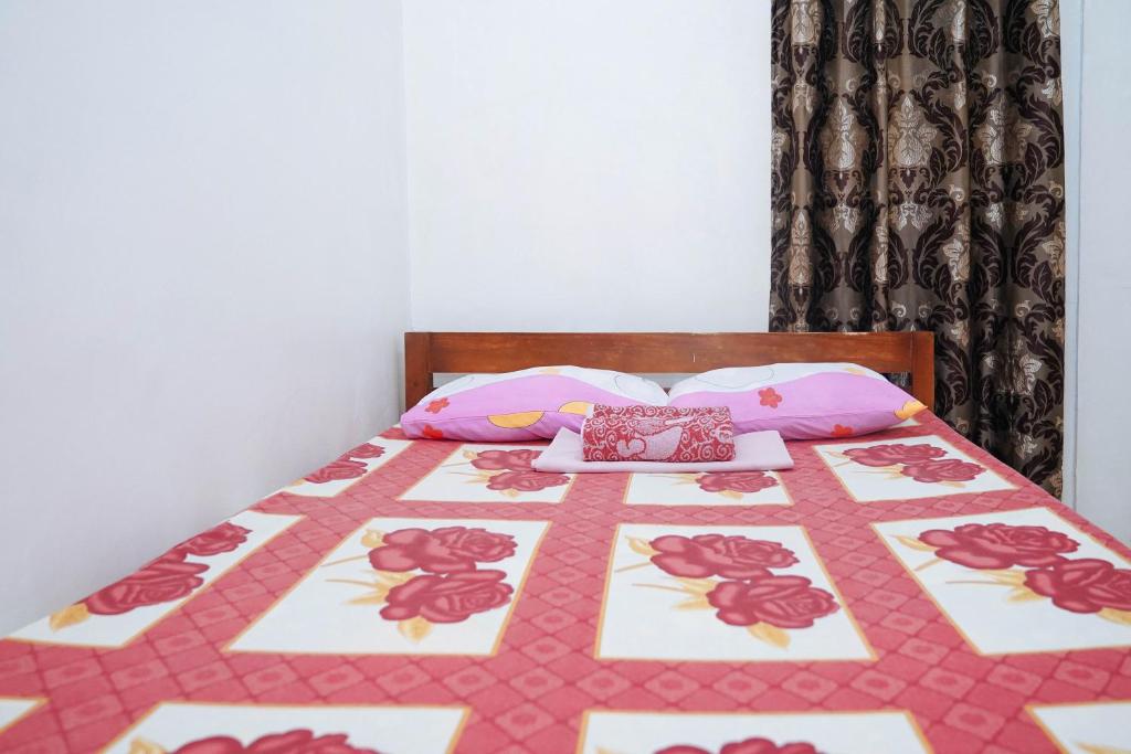 Postel nebo postele na pokoji v ubytování C Star Travellers Inn