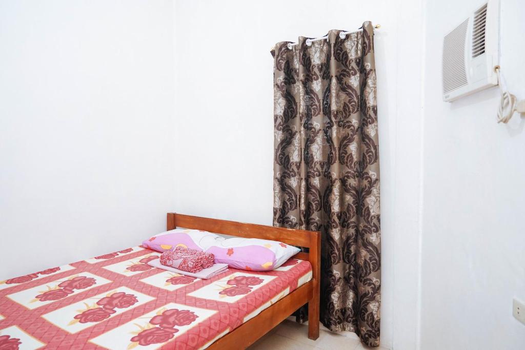 Postel nebo postele na pokoji v ubytování C Star Travellers Inn